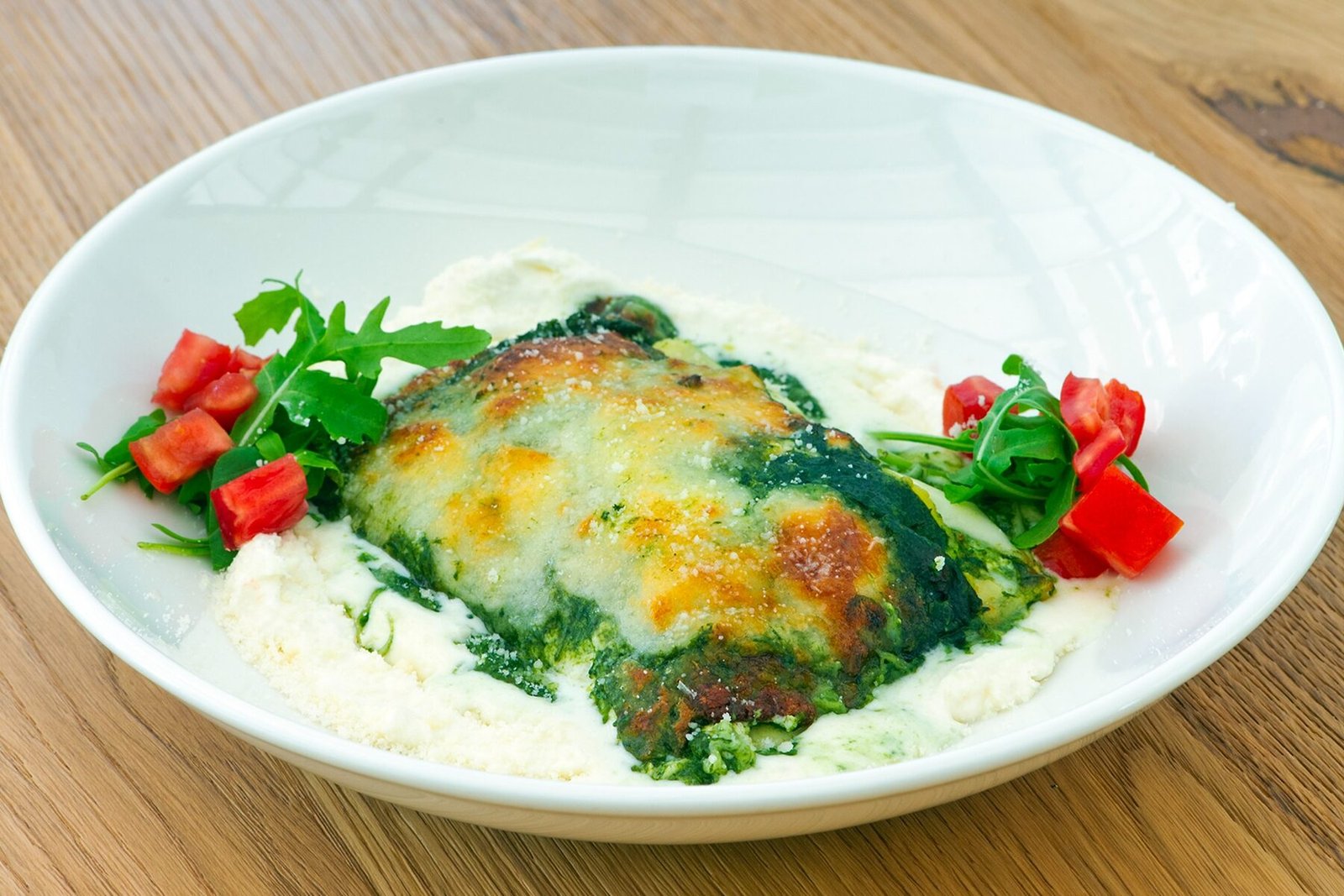 Lasagna al manto verde di spinaci, mozzarella e ricotta